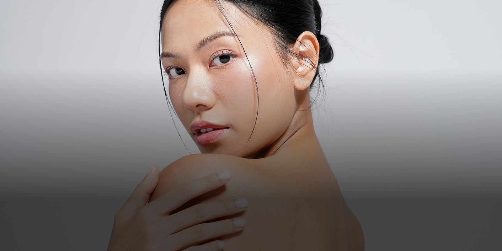 Woman with natural beauty and radiant skin.