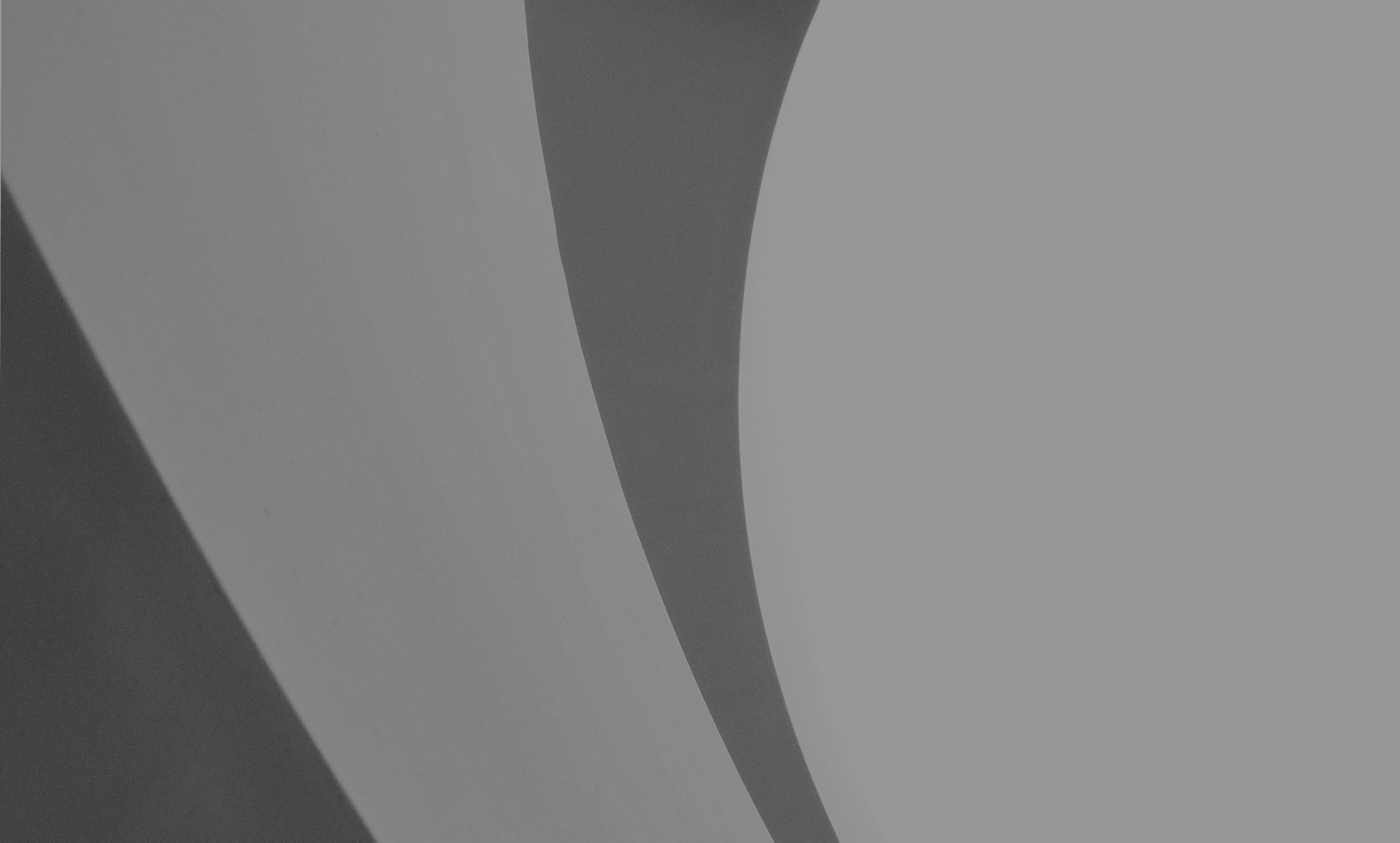 Abstract waves in shades of gray.