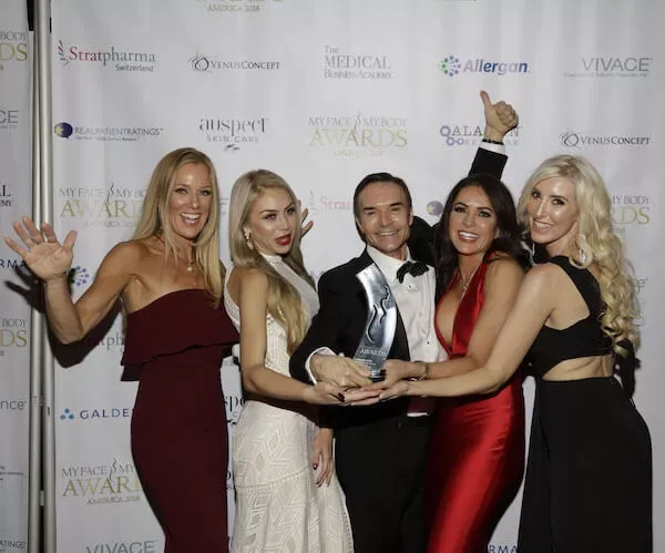 Group celebrating at My Face My Body Awards.