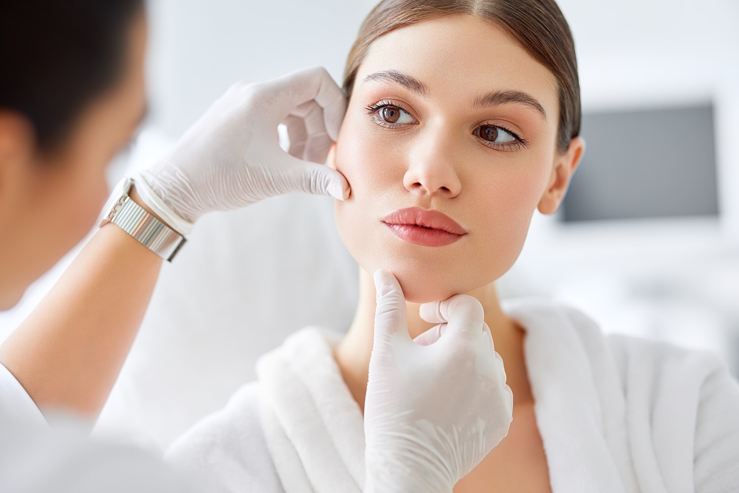 Professional skincare consultation in a clinical setting.