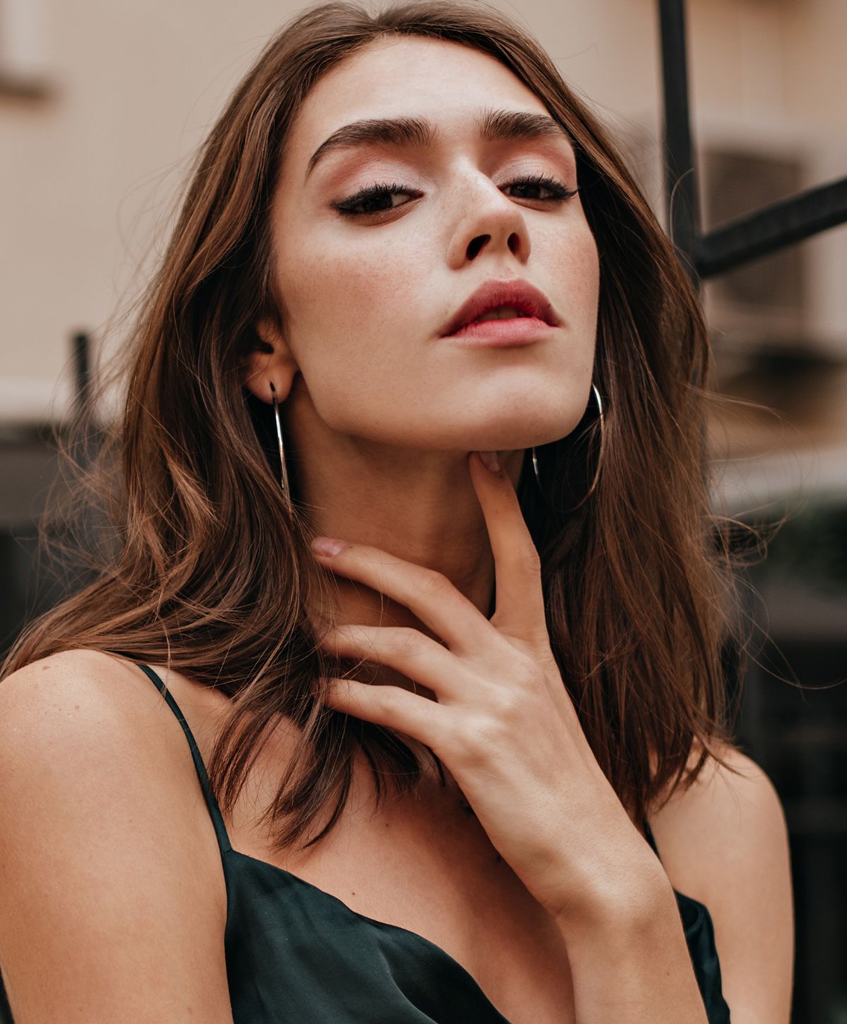 Woman with elegant pose and natural makeup.